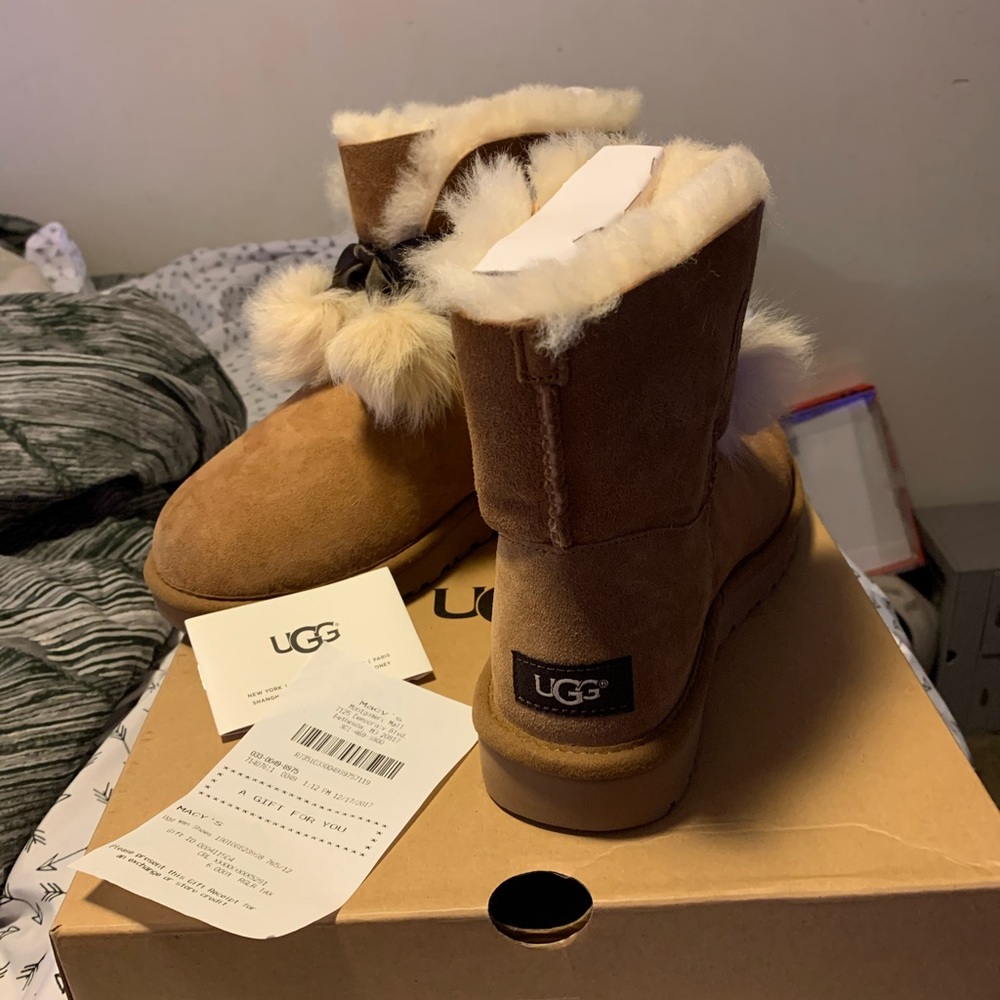 NEVER WORN ! UGG BOOTS with fur balls! BRAND NEW